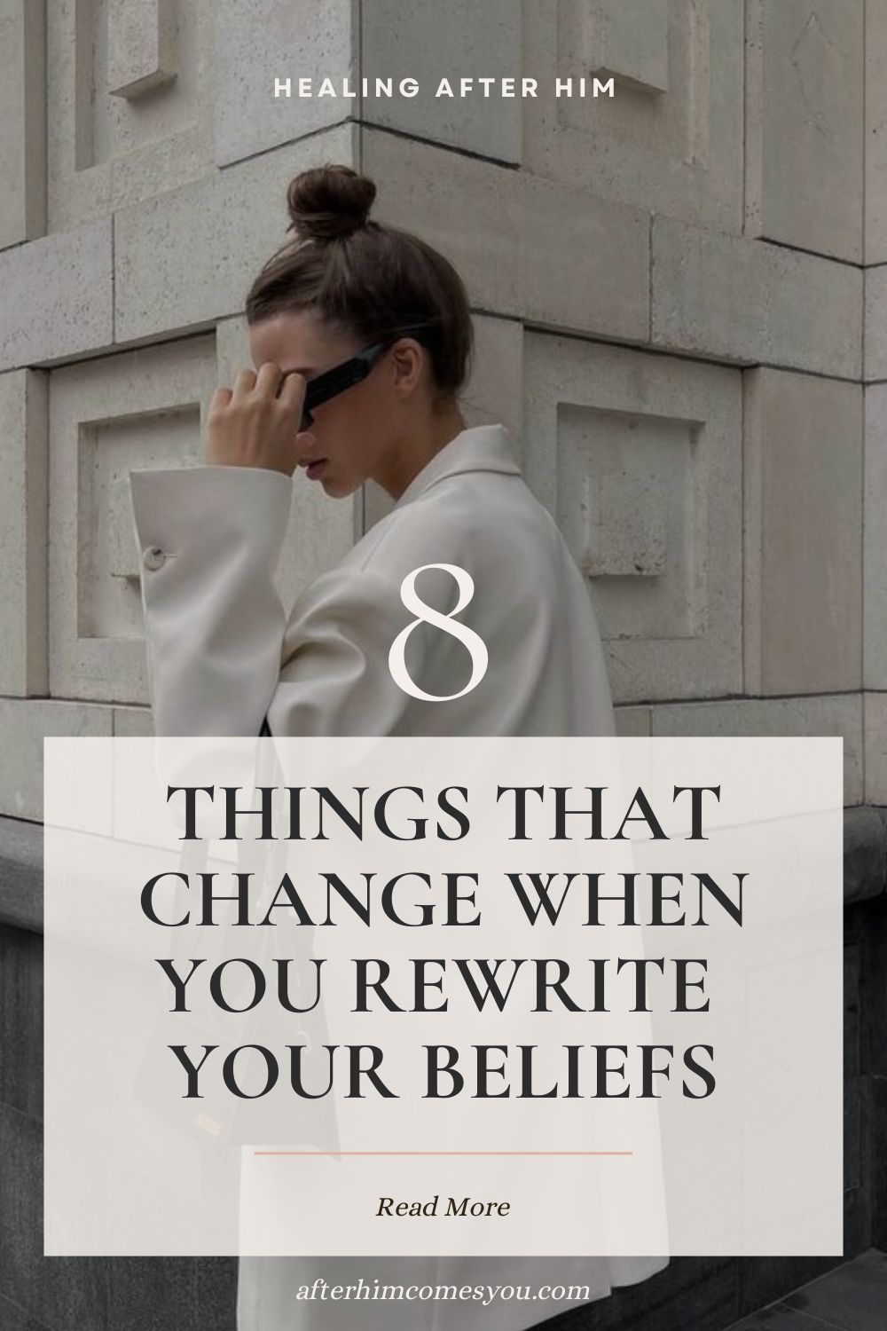 8 Things That Change When You Rewrite Your Beliefs. A woman in a cream blazer and sunglasses stands beside a stone building.