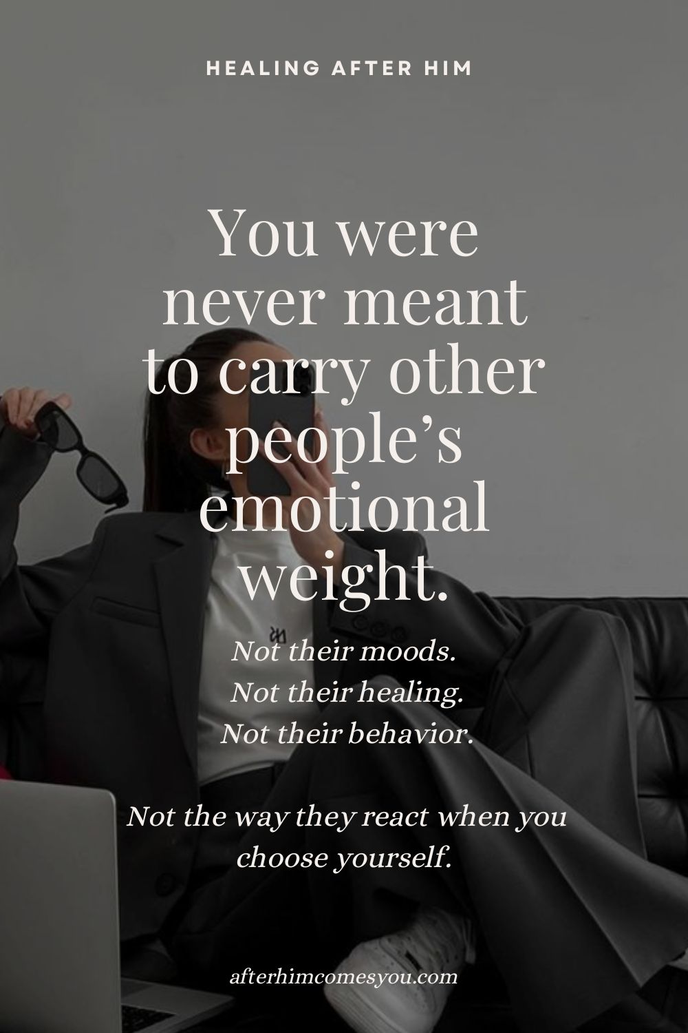 You were never meant to carry other people’s emotional weight. Not their moods. Not their healing. Not their behavior. Not the way they react when you choose yourself. A woman in a dark suit sits on a sofa holding her phone.
